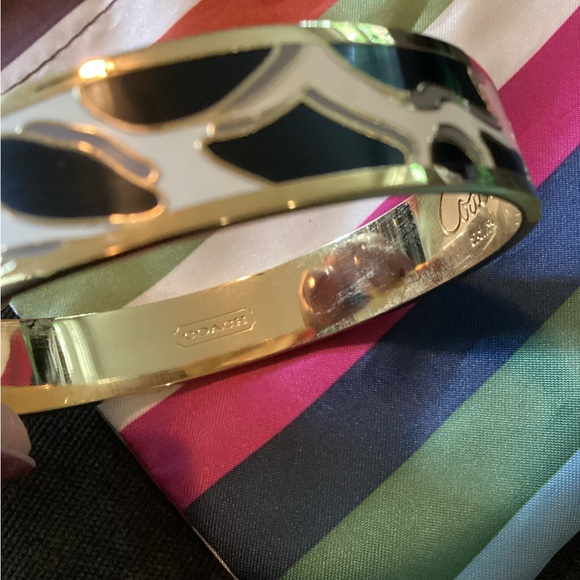 Coach Gold and Black and cream animal print bangle bracelet. - Picture 3 of 16
